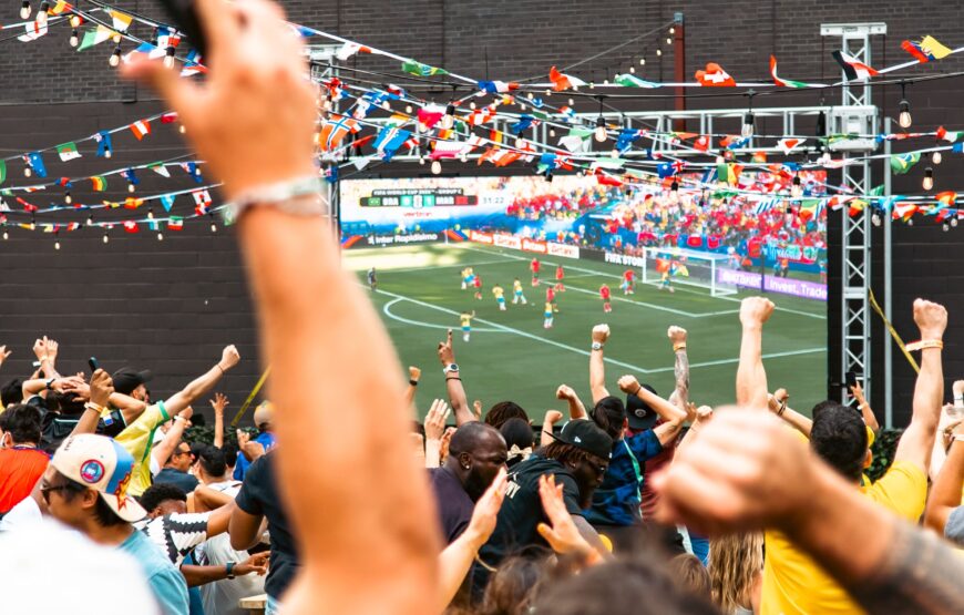 Soccer fans cheer during an outdoor FIFA World Cup watch party in downtown Montclair, New Jersey.